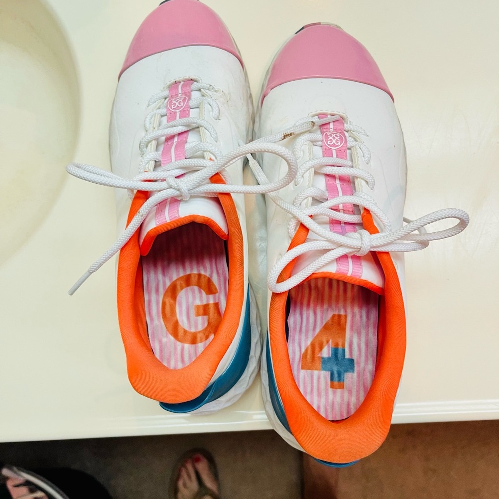 GFore gold shoes